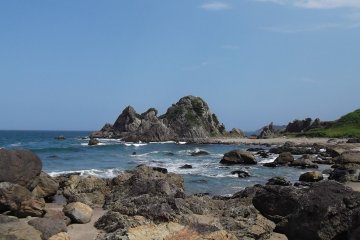 <p>The path sometimes follows hard by the rocky shore</p>