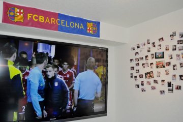 Huge TV screen always showing sports