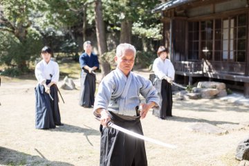 A master teaching Japanese sword