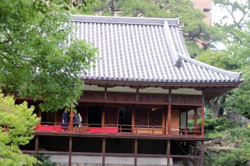 The building features four distinct rooms. Rotating displays of calligraphy works are inside.