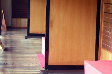 Take a seat on the red covered benches and reflect.