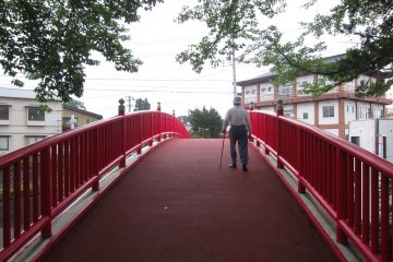 The Red Bridge that links the park to the other side of town