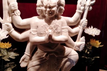 108 Buddhist statues decorate the interior of every other floor. Praying at each one will remove every desire humans have.