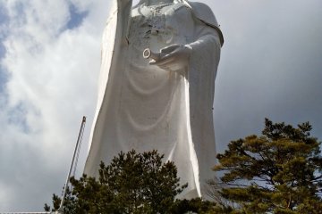 The statue towers everything around it.