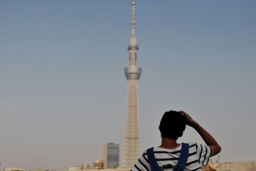 A visitor observing the Skytree Building