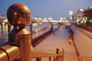 The promenade lights up at night.