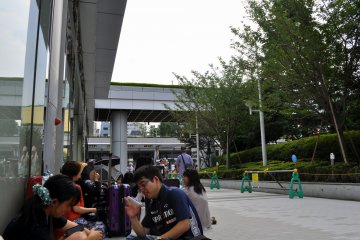 A cosplayer's day starts bright and early, if they want to get prime queue standings