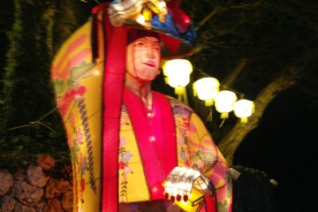 Larger than life Ryukyu court officials transport you to an earlier time.