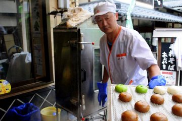 Freshly steamed manju are ready for distribution