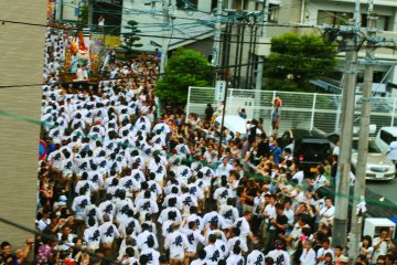 Thousands of men participate in this festival, creating a river of people