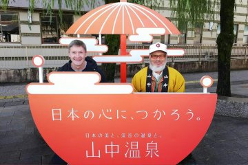 With one of the friendly English speaking guides at Yamanaka Onsen