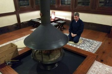 The log fire in the communal room at Ikumo Hotel