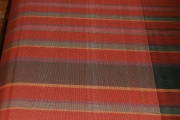 You can see the difference in the way people weave from the random patterns made on the sample textile - weaving reflects pesonalities