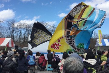 In previous years, there are stage events such as this dance with huge flags.