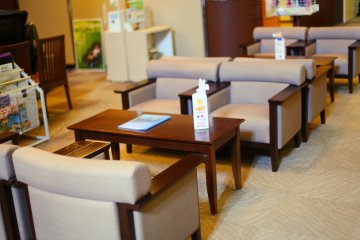The main reception lobby--Japanese-language newspapers and manga are available here.