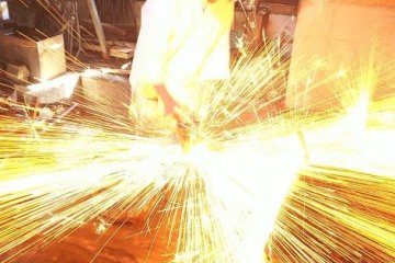 Pumping the traditional Japanese bellows (Asano Taro)
