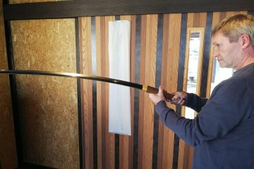 Viewing one of Taro's swords