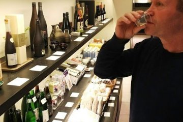Sampling the various varieties of Sake at the Fukumitsuya Brewery.
