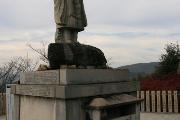 Buddhist statue on the lookout area.