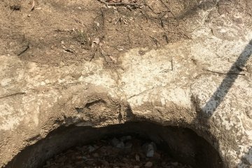 A small tomb top - bigger tomb bottom