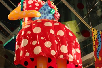 A sweet girl on a swing at the Polka Dot Garden.