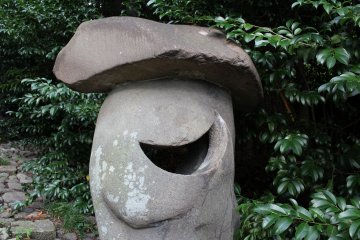 Stone lantern with crescent moon carvi