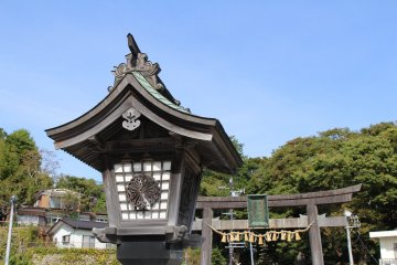 Wooden lantern at the entrance of Shiogama Shrine
