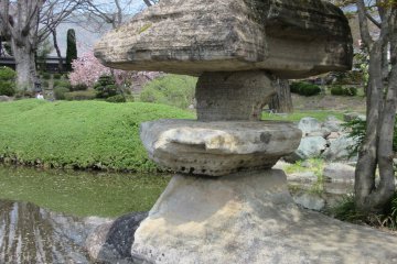 Garden lantern from layered stone