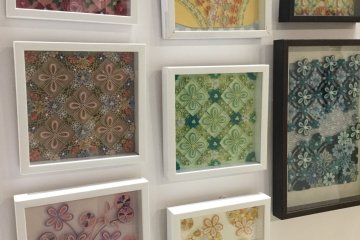 Framed paper quills.