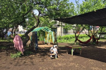 Children let their imagination run wild in this very basic play house.