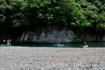 The bank of the river was a good place for sunbathing.