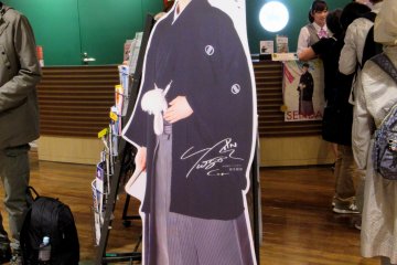 Yuzuru's photo meets guests to the city