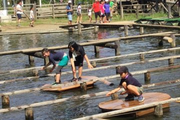 Pull the rope or rock the raft to cross