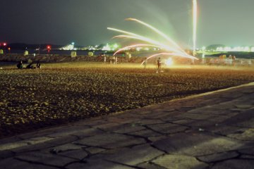 At the same time the beach gets full of kids playing with firecrackers.