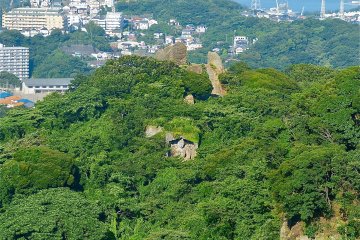 That's Tokyo Bay beyond the greenery, and notice the statue cut into the rock