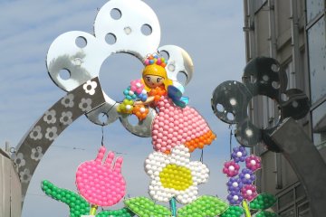 Spring sign at the entrance to Takeshita Street in Harajuku