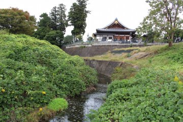 A view of Zenshoji from the river