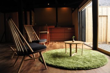 The graceful space of these 'kominka' has been created with stylish furniture, like these chairs which were produced by a well known chair-making company located in Hida-Takayama