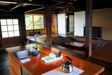 The kitchen comes equipped with a high-tech induction stove, as well as other modern amenities