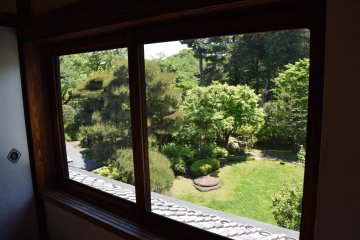 A view onto the garden of one of the villas