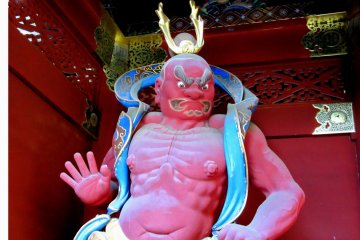 The guardian on the left with his closed-mouth 'n' sound in Nikko.