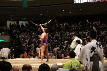 Bow-twirling ceremony, with traditional bamboo 'yumitori-shiki'