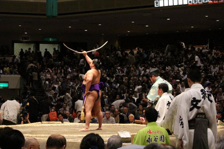 Bow-twirling ceremony, with traditional bamboo 'yumitori-shiki'