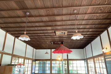 The ceiling of the station still has the original panelling, with the vent for the kerosene stovepipe
