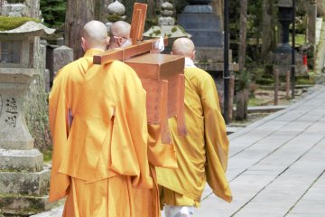 Monks processing through Okuno-in towards the mausoleum