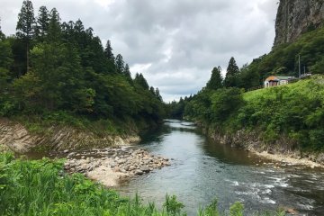 It sits right by a river, offering serenity and lovely views