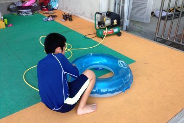 <p>Bring along inflatable water toys or buy one at the pool; this air pump will ensure you won't have to blow it up yourself</p>