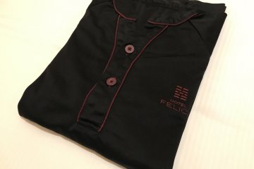 Pajamas on the bed for you so you can pack light!