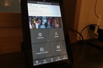In room touch screen that offers information about hotel amenities and services