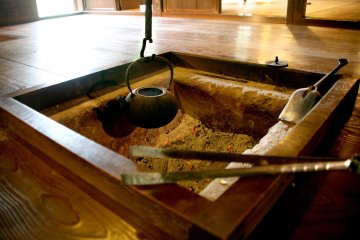 The irori indoor hearth at Ichinoe Nanushi Yashiki